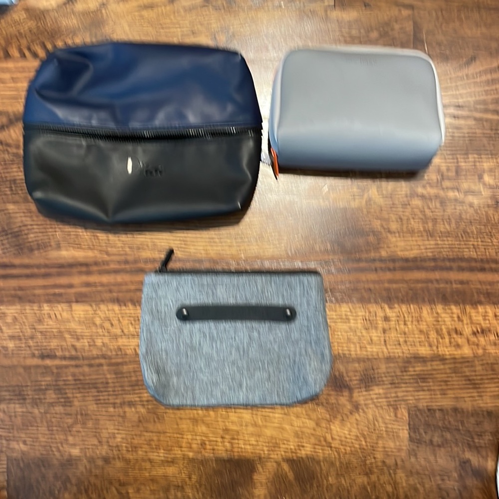 Dior, Cole Haan, and Victorinox Pouches. RARE SELECTION. All brand new